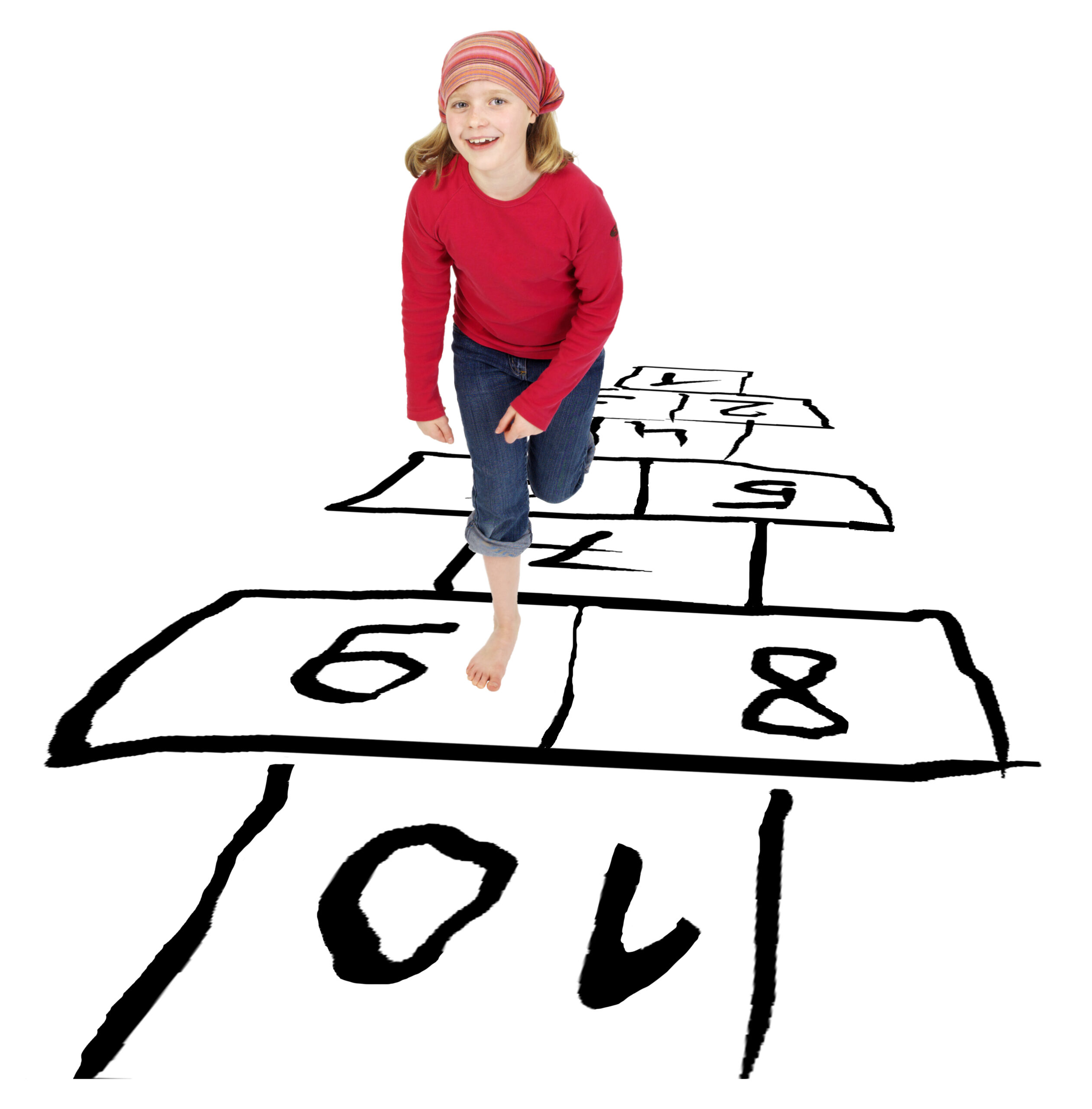 Meisje dat hinkelt op een hinkelbaan.